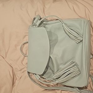 Gray backpack Gray backpack with tassels.